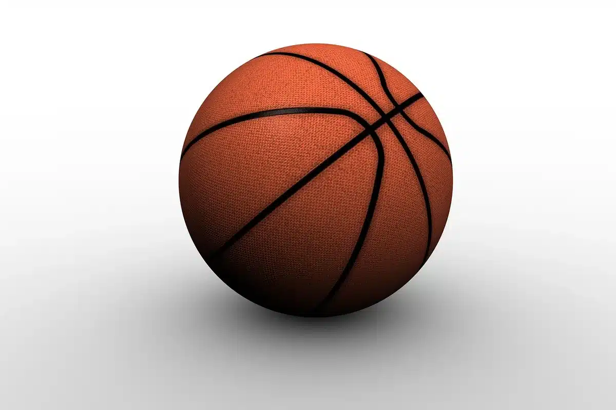 Stat sheet and basketball illustrating Rollins' breakout season numbers