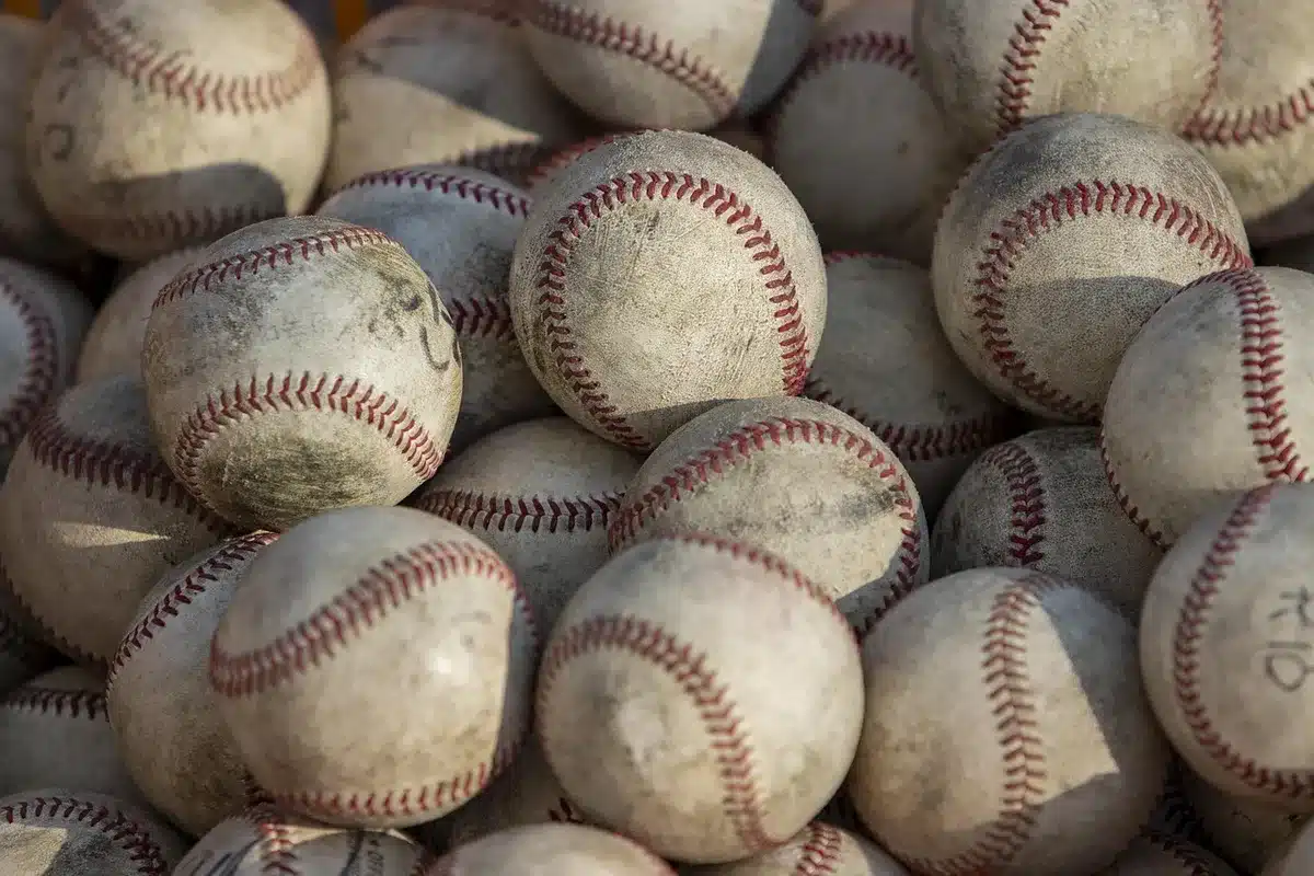 Outfielder reading a fly ball and preparing to make a play