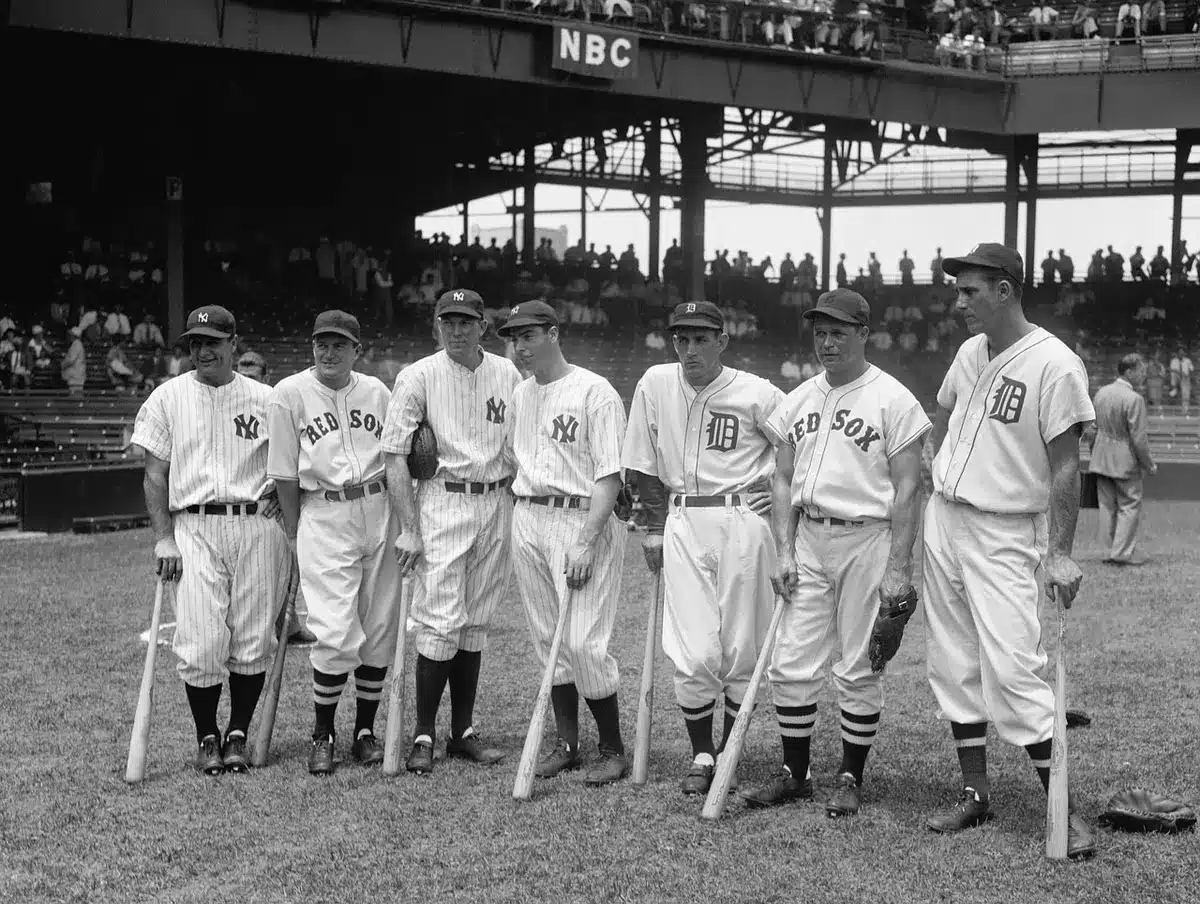 Players gathered in a dugout discussing strategy