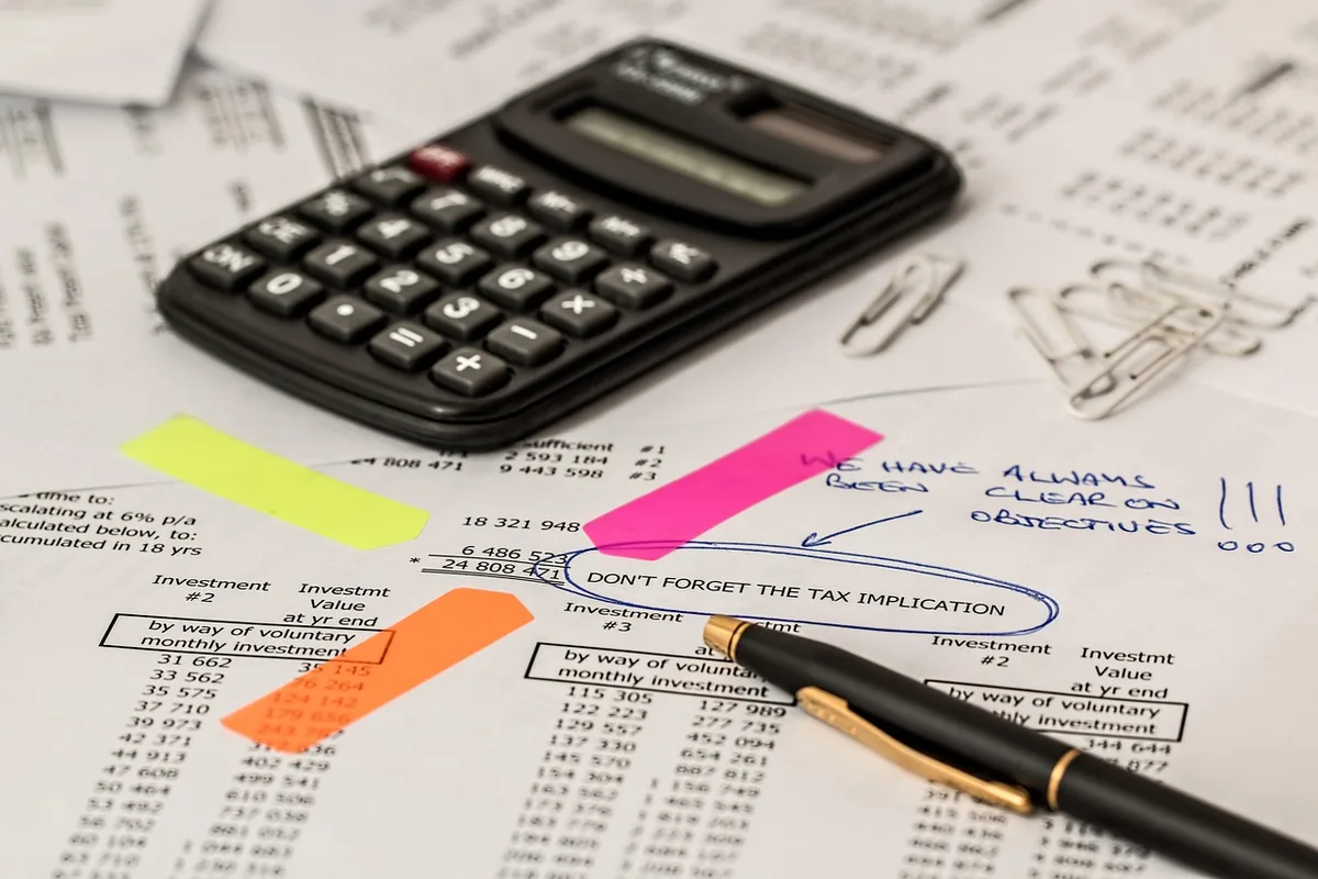 Front office executives discussing trades with roster charts on a table