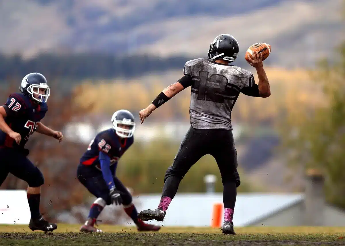 Football bouncing near the five-yard line after a punt