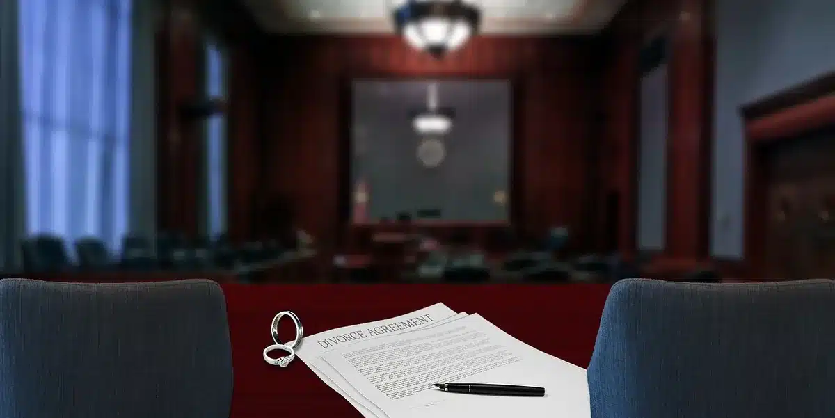 Stack of legal documents and a gavel symbolizing league discipline and contract review