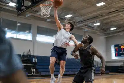 Nate Ament presses Bucks forward Kyle Kuzma